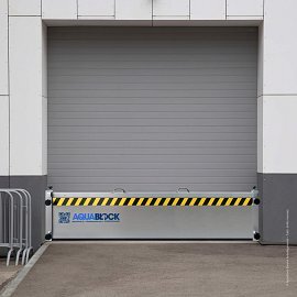 Paratia antiallagamento montaggio in luce Aquablock installazione magazzino logistico